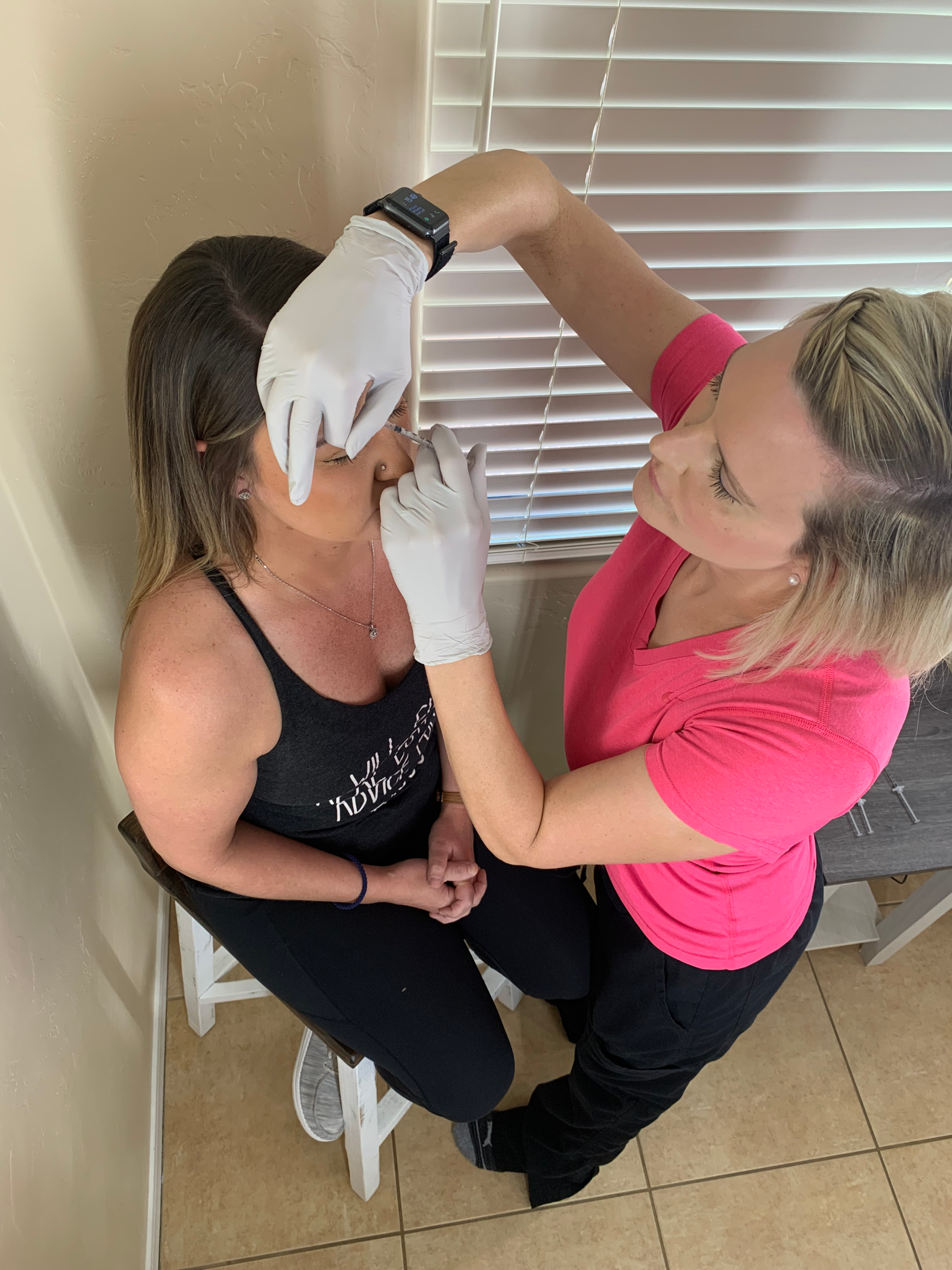 Kelley Beck, Family Nurse Practitioner and Tucson medical aesthetic injector, performing a neurotoxin treatment
