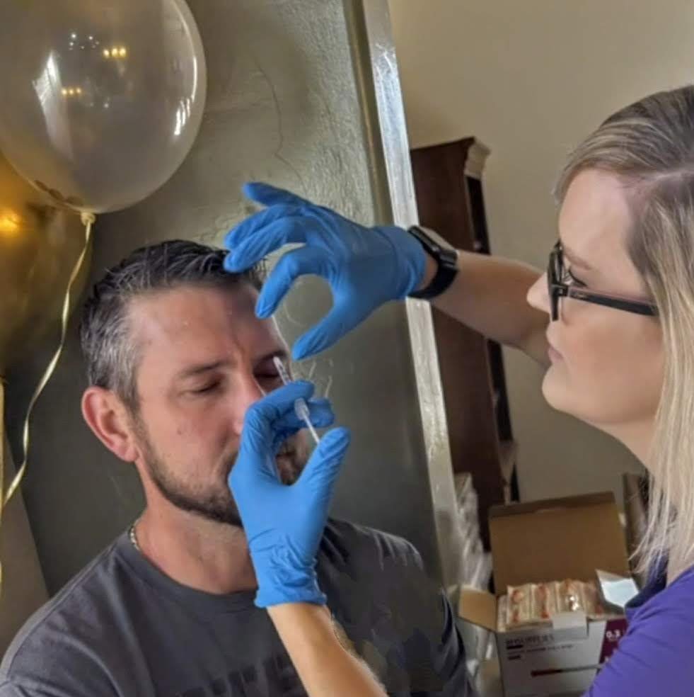 Kelley providing a personalized neurotoxin treatment for a male patient in Tucson, Arizona